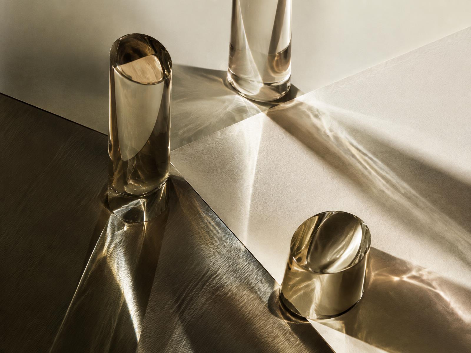 Glass fragrance forms in an Oudisan light installation